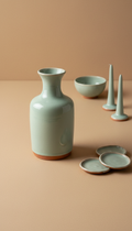 Hand-thrown celadon ceramic vase